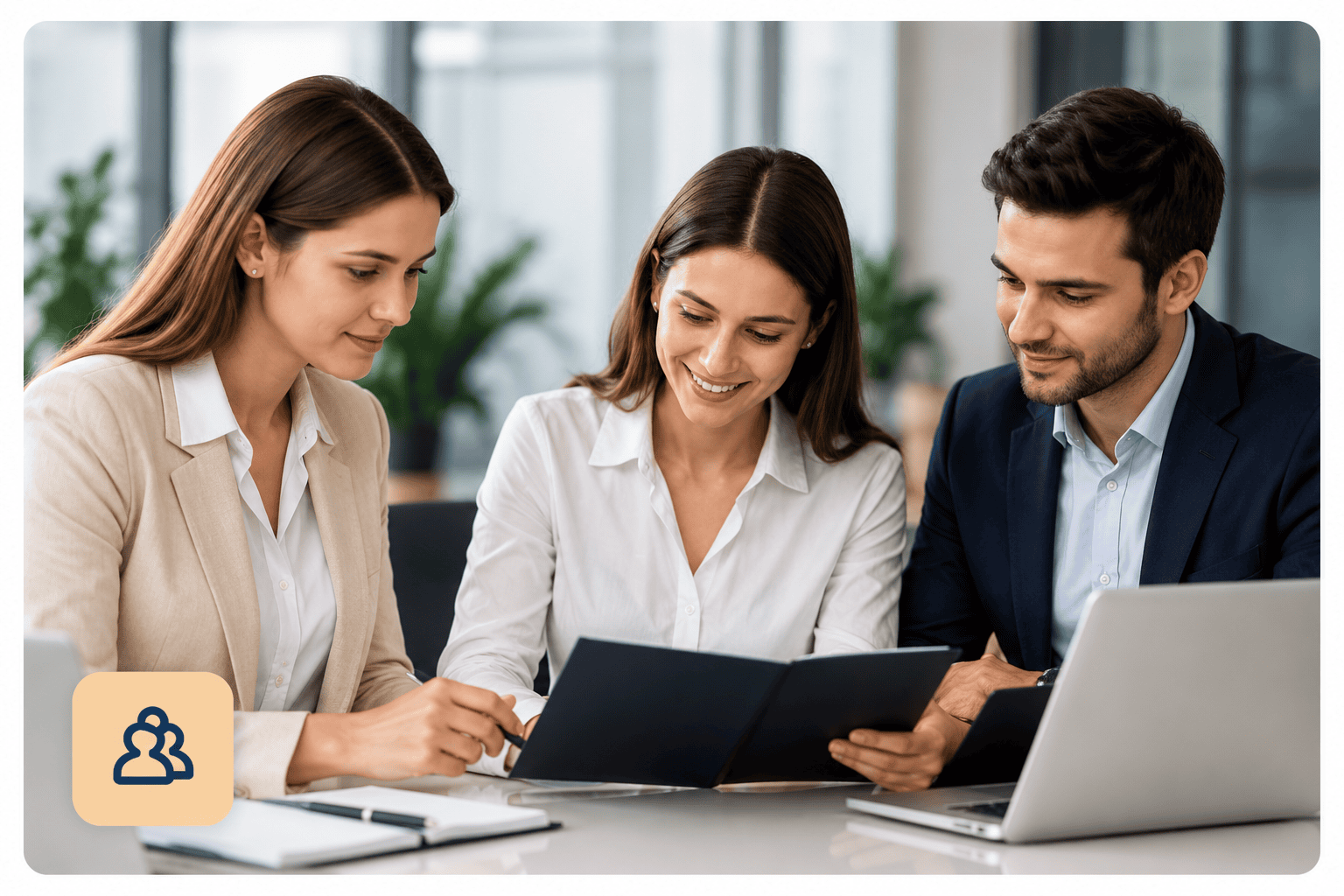 Professionals discussing information and reviewing documents in a modern office
